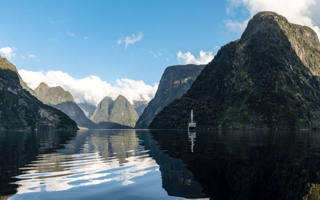 One of the countries that literally blew my mind with its nature was New Zealand. My husband and I visited New Zealand in 2018 Spring, and we toured both Islands, but my absolute favourite activity by far was our overnight cruise in Doubtful Sound.